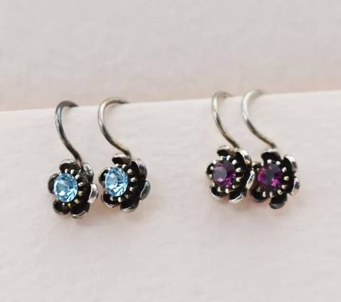 Birthstone Earrings: Discover Gemstone Meanings, Cuts, Settings, and Design Features